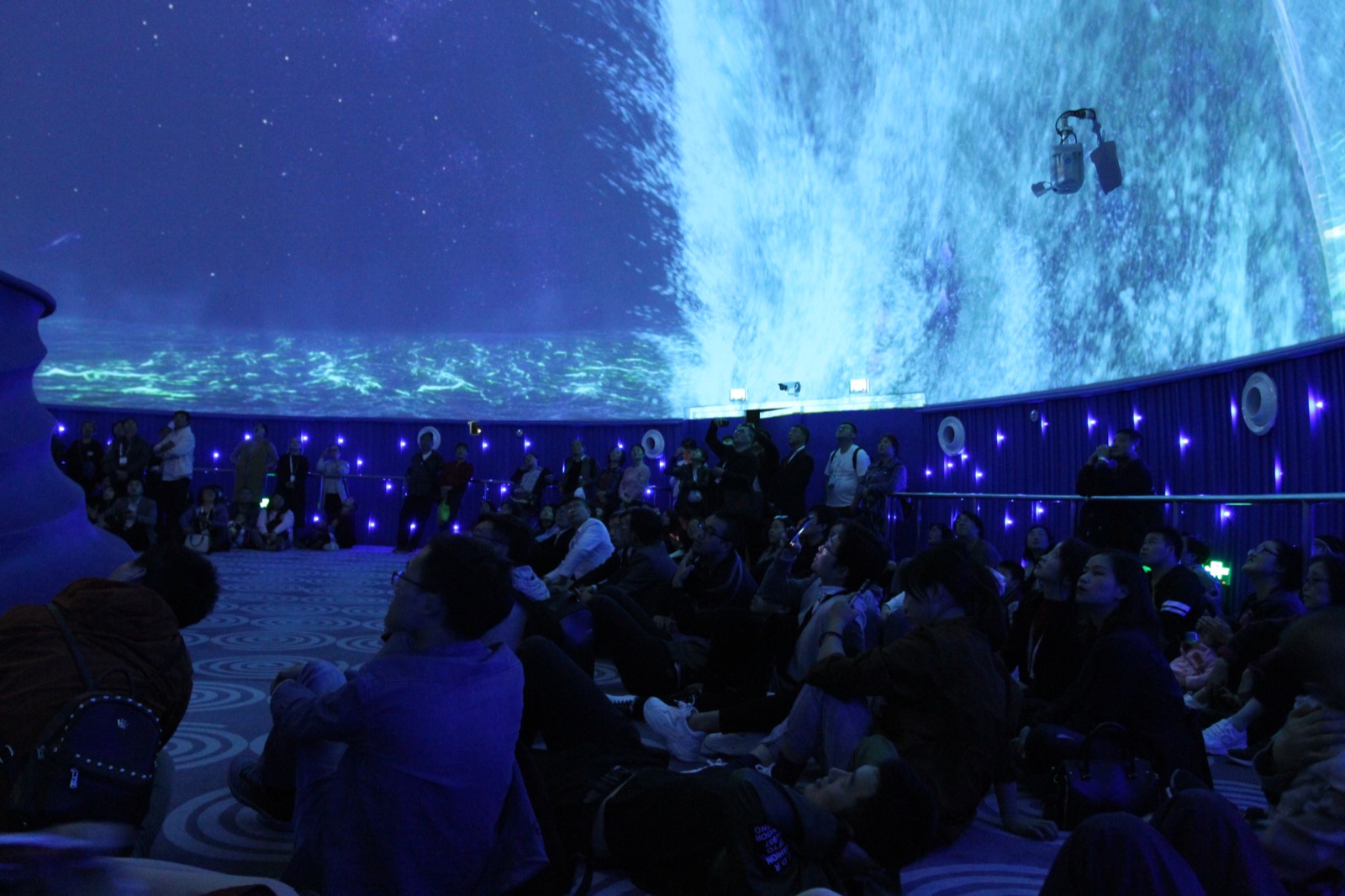 Sea of Time full-dome ocean projection with visitors